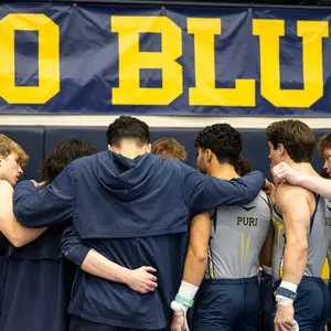 Men's Gymnastice Team Huddle