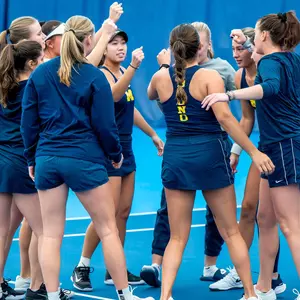 Women's Tennis Team Huddle