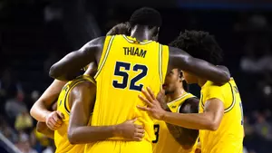 Men's basketball team huddle