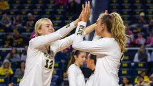 Jenna Hanes, left, and Sydney Schnichels