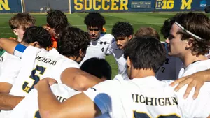 Men's Soccer Team Huddle