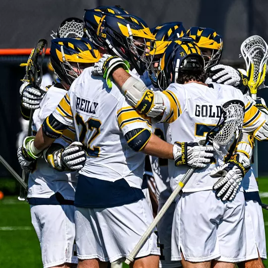 Men's Lacrosse team huddle