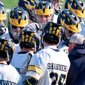 Men's Lacrosse Team Huddle