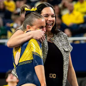 Quincy Walters, left, and head coach Maile'ana Kanewa-Hermelyn