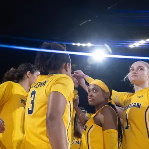 Women's basketball team huddle