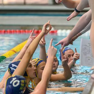 Water Polo Team Huddle