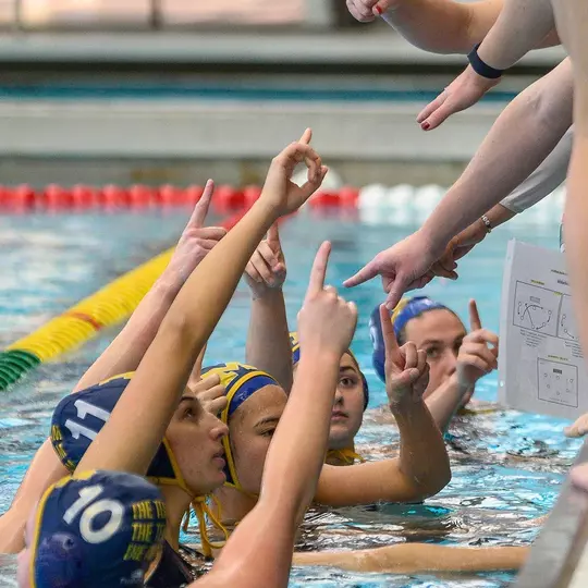 Water Polo Team Huddle