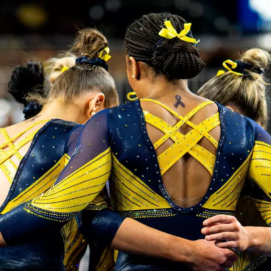 Women's Gymnastics Team Huddle