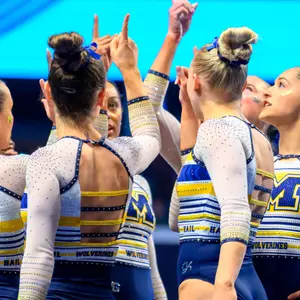 Women's Gymnastics Team Huddle - Big Ten Championships