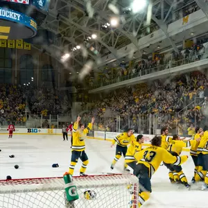Ice hockey team celebration after 2026 Big Ten Tournament title