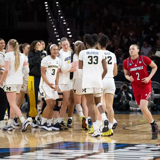 Women's basketball team celebration in NCAA Sweet 16 game