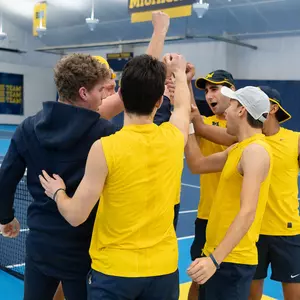 Michigan men's tennis team huddle