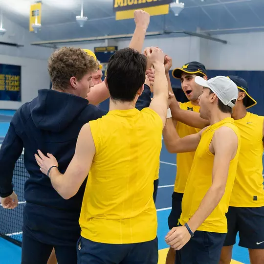 Michigan men's tennis team huddle