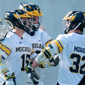 Men's Lacrosse Group Huddle