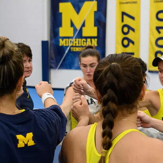 Women's tennis team huddle