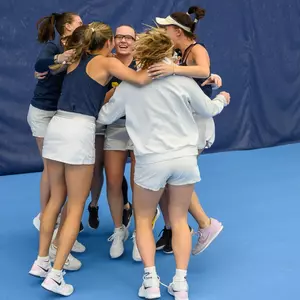 Women's Tennis Team Huddle