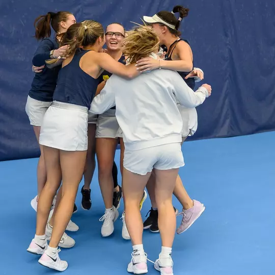 Women's Tennis Team Huddle