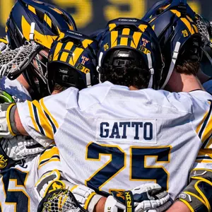 Men's Lacrosse Group Huddle
