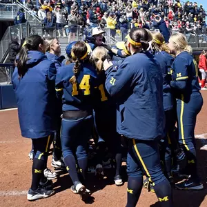 Softball team celebration at the plate versus Ohio State