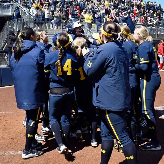 Softball team celebration at the plate versus Ohio State