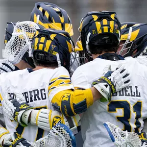 Men's Lacrosse Group Huddle