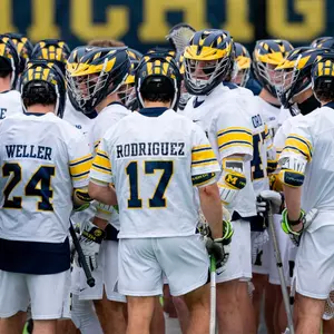 Men's Lacrosse Team Huddle