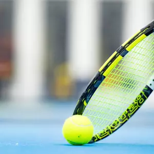 Women's tennis generic tennis ball and racket