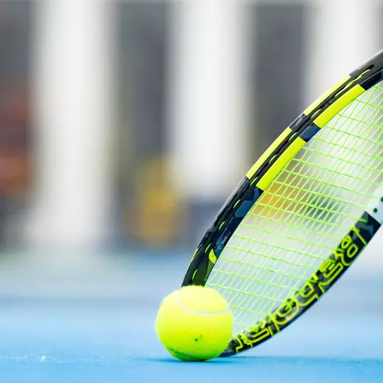 Women's tennis generic tennis ball and racket