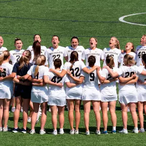 Woomen's Lacrosse Team Huddle