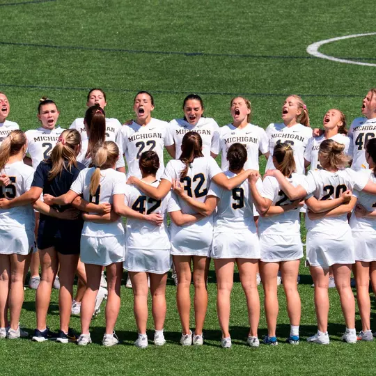 Woomen's Lacrosse Team Huddle