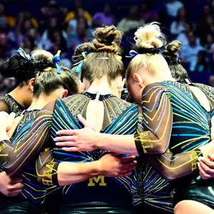 Women's Gymnastics Team Huddle