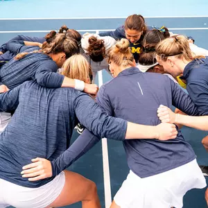 Women's Tennis Team Huddle