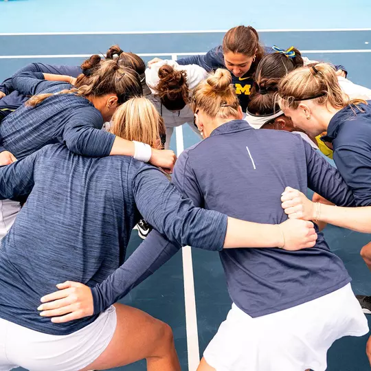 Women's Tennis Team Huddle