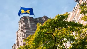 Block M Flag on Campus Building
