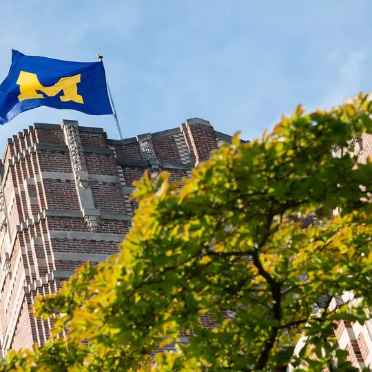 Block M Flag on Campus Building