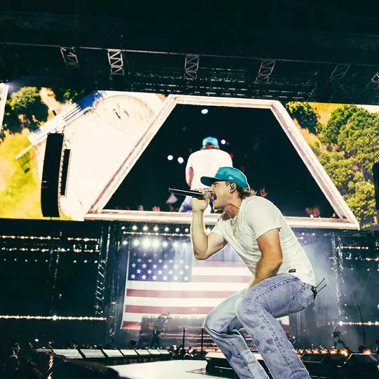 Morgan Wallen in concert performing