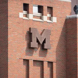 Football Brick M on Brick Wall