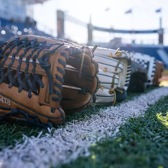 Softball Gloves on First-Base Line