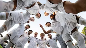 Men's Soccer Team Huddle