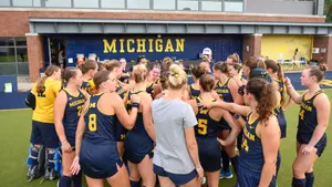 Field hockey team huddle