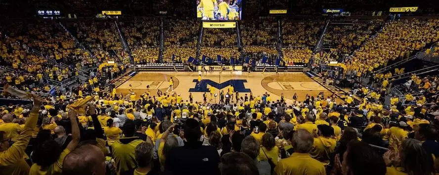 Crisler Center bowl with fans in maize