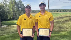 RJ Arone (left) and Spencer Shropshire (Michigan Athletics)