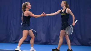 Women's Tennis Doubles Celebration