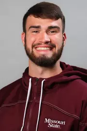 AJ Huskey headshot
