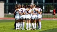 Women's Soccer team huddle