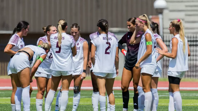 Women's Soccer team huddle
