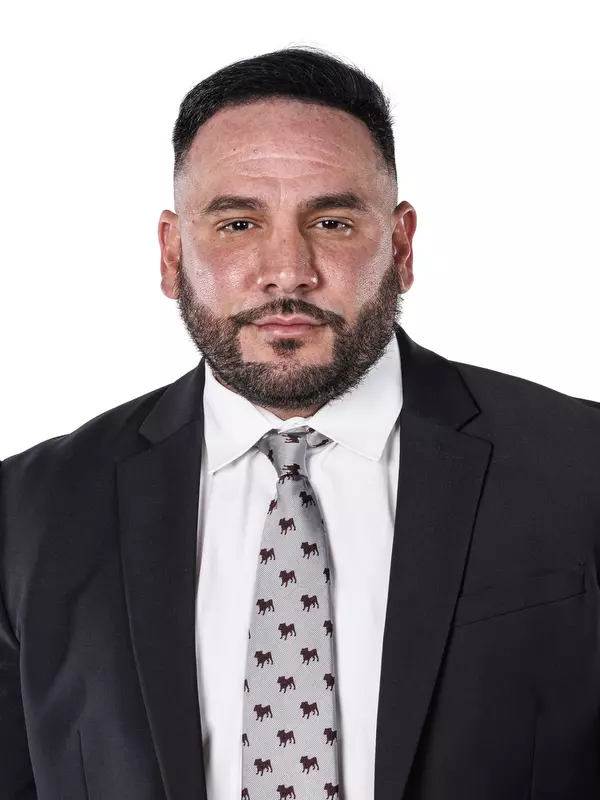 STARKVILLE, MS - October 05, 2022 - Mississippi State Assistant Coach Gabe Lazo headshot taken during the Women’s Basketball 2022-2023 Production Day at Mize Pavilion at Humphrey Coliseum in Starkville, MS. Photo By Kevin Snyder