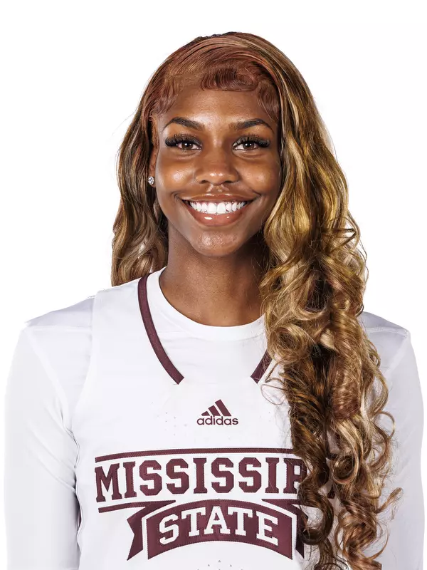 STARKVILLE, MS - October 05, 2022 - Mississippi State Guard Mia Moore (#12) headshot taken during the Women’s Basketball 2022-2023 Production Day at Mize Pavilion at Humphrey Coliseum in Starkville, MS. Photo By Kevin Snyder