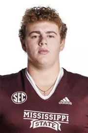 STARKVILLE, MS - May 31, 2022 - Mississippi State Offensive Lineman Hastings Carruth headshot taken at the Leo Seal Jr. Football Complex at Mississippi State University in Starkville, MS. Photo By Austin Perryman