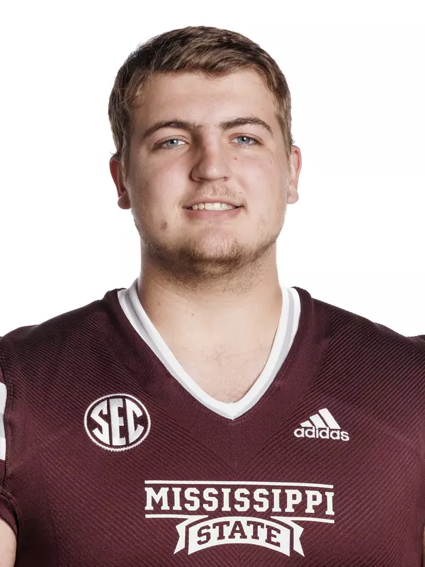 STARKVILLE, MS - May 31, 2022 - Mississippi State Offensive Lineman Wesley Davis headshot taken at the Leo Seal Jr. Football Complex at Mississippi State University in Starkville, MS. Photo By Austin Perryman